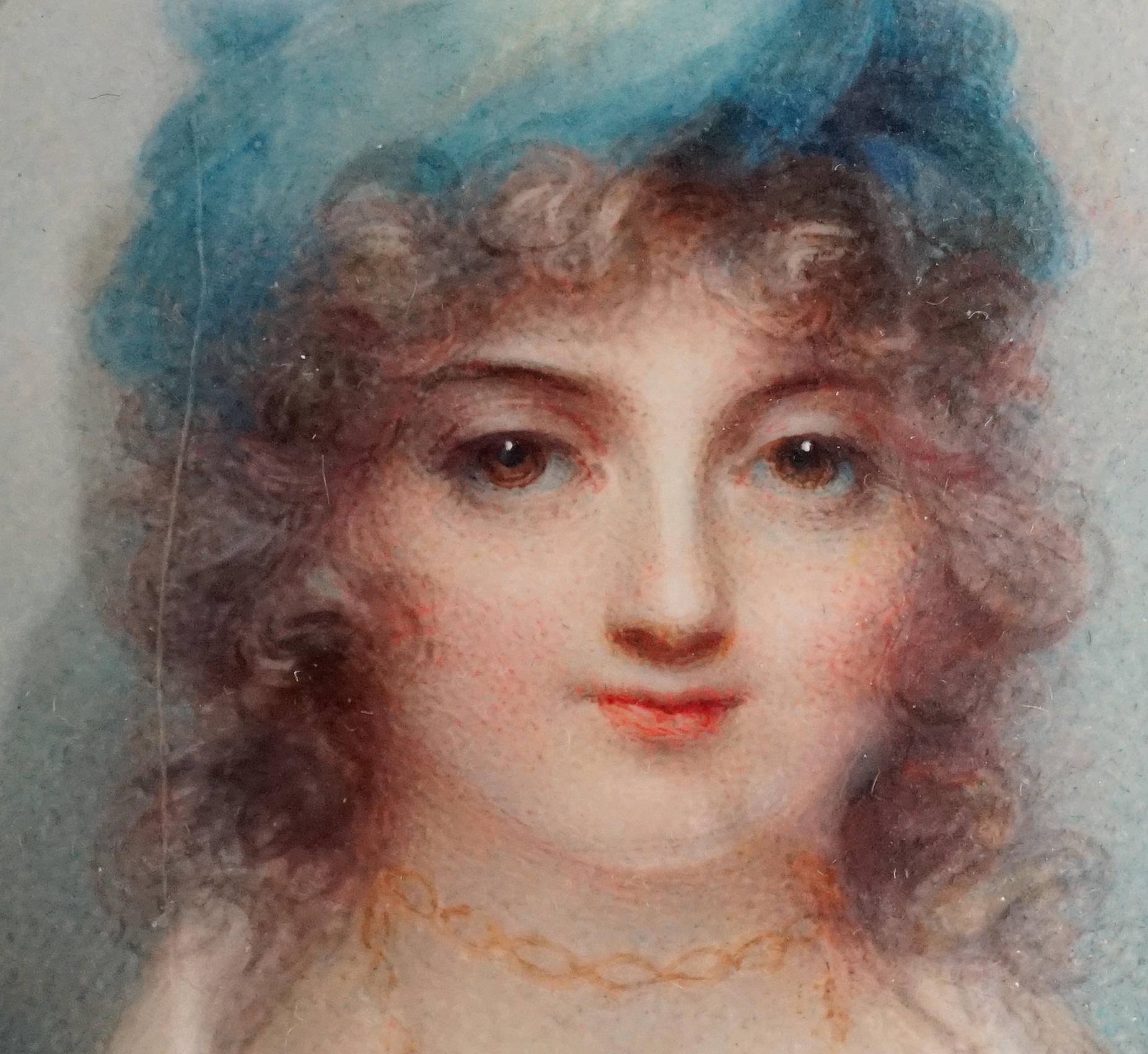 Mrs Anne Mee, née Foldsone (British, 1775-1851), Portrait miniature of a lady wearing a blue hat, white dress and gold chain, watercolour on ivory, 7.5 x 5.8cm. CITES Submission reference 82LL68YT